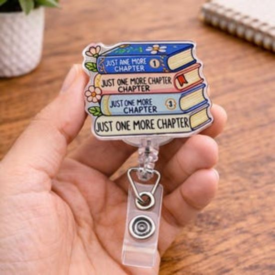 Just One More Chapter – Stacked Books Badge Reel, Keychain, Phone Charm accessory